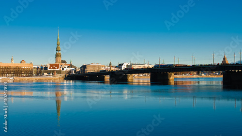 riga. in the photo, a panorama of the city against the blue sky © fotofotofoto