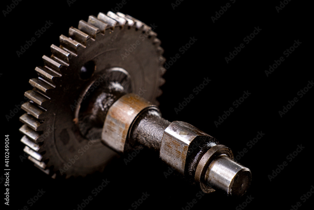 Camshaft from a small internal combustion engine. Accessories for repairing drive systems. Camshaft from a small internal combustion engine. Accessories for repairing drive systems.