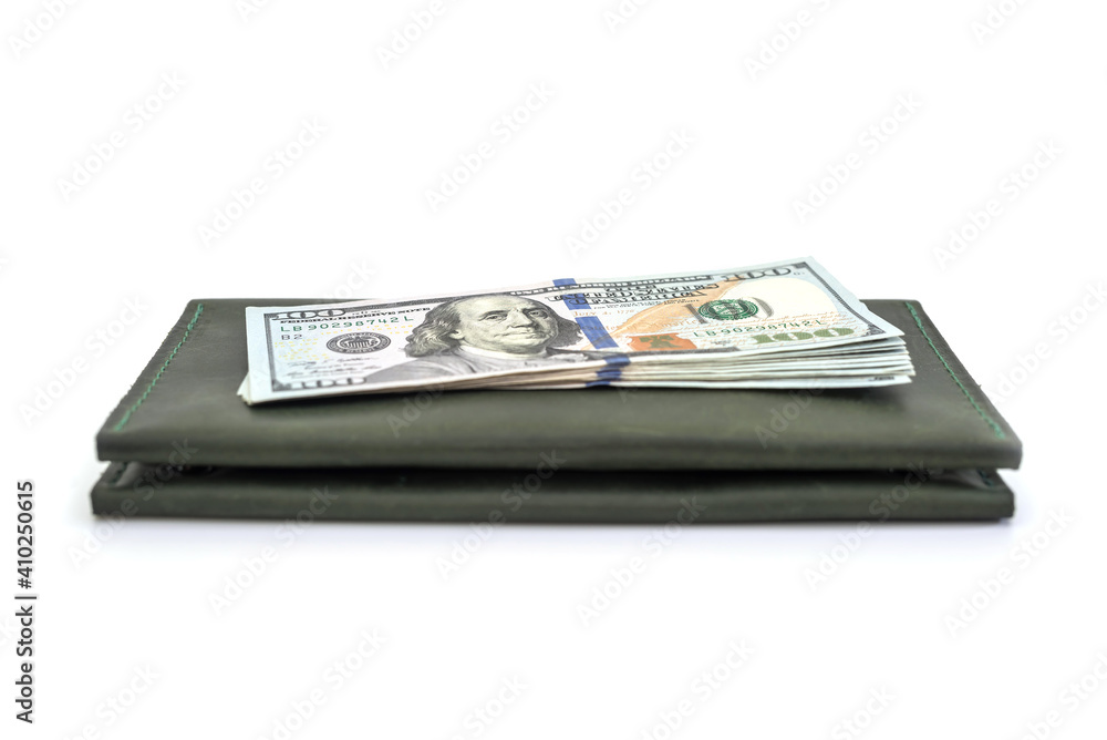 leather wallet and US dollars isolated on white background. leather wallet and US dollars isolated on white background.