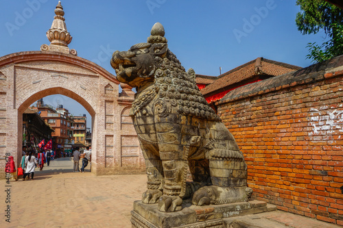 Nepal, Bhaktapur, gardien lion staatue in the Durbar Square photo