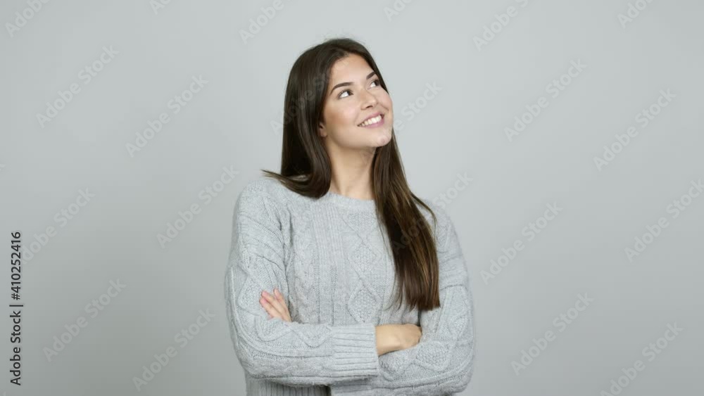 Teenager Brazilian girl looking up over isolated background