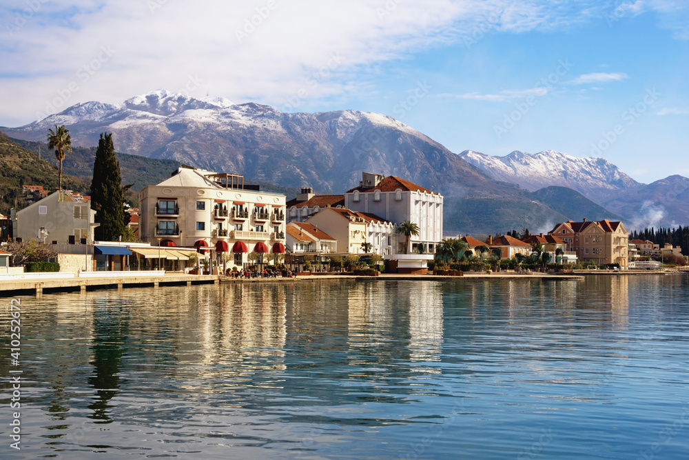 Beautiful Mediterranean landscape on sunny winter day. Embankment of Tivat city.  Montenegro, Adriatic Sea, Bay of Kotor