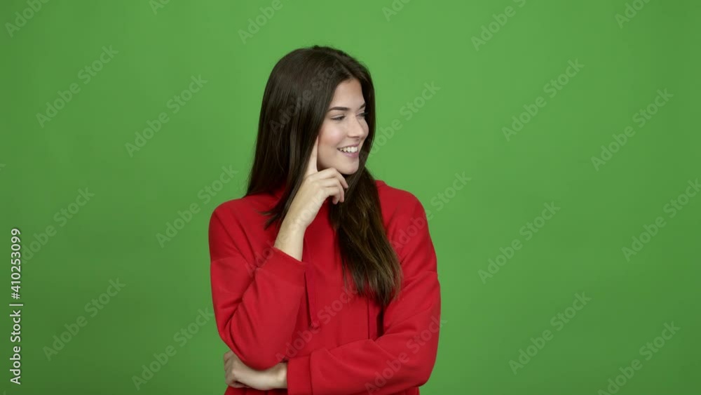 Teenager Brazilian girl standing and looking to the side over isolated background. Green screen chroma key video Teenager Brazilian girl standing and looking to the side over isolated background. Green screen chroma key video