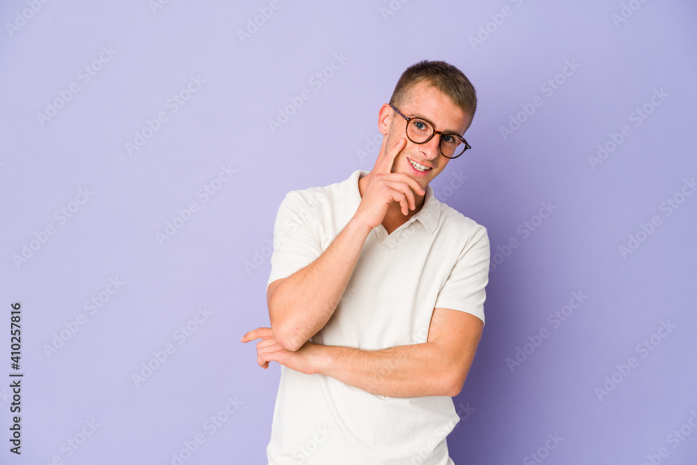Young caucasian handsome man smiling happy and confident, touching chin with hand. Young caucasian handsome man smiling happy and confident, touching chin with hand.