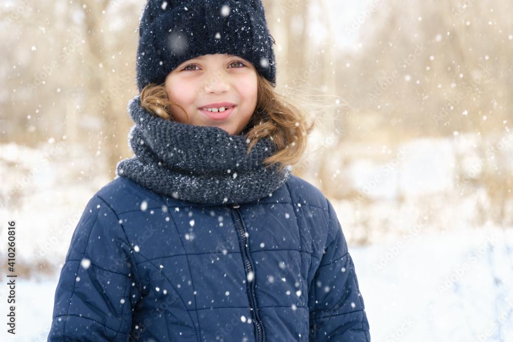 child girl playing with snow in winter outdoor and having fun on snowy winter child girl playing with snow in winter outdoor and having fun on snowy winter