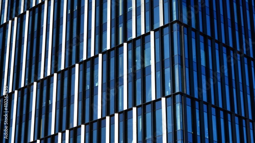 Wallpaper Mural Glass facade of the buildings with a blue sky. Skyscrapers in the business city center.. Background of modern glass buildings.  Torontodigital.ca
