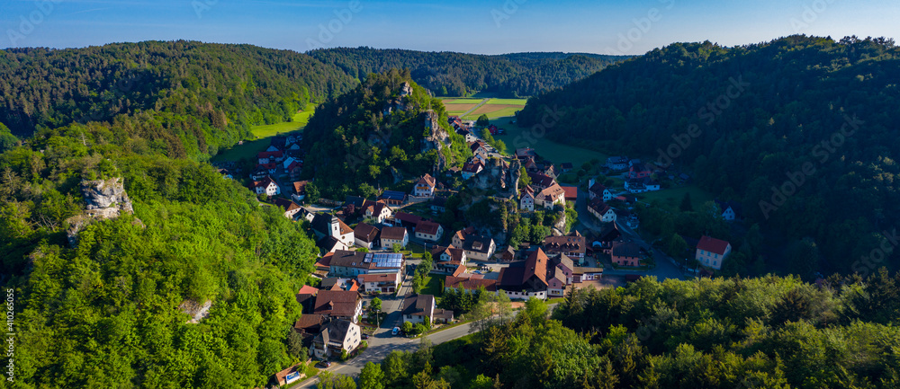 Aerial view around the city Pottenstein in Germany, Bavaria on a sunny morning in spring.	