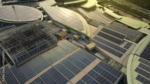 4K UHD Footage Of Aerial view of a solar panel on building roof top. Part of reduce reuse and restore concept	