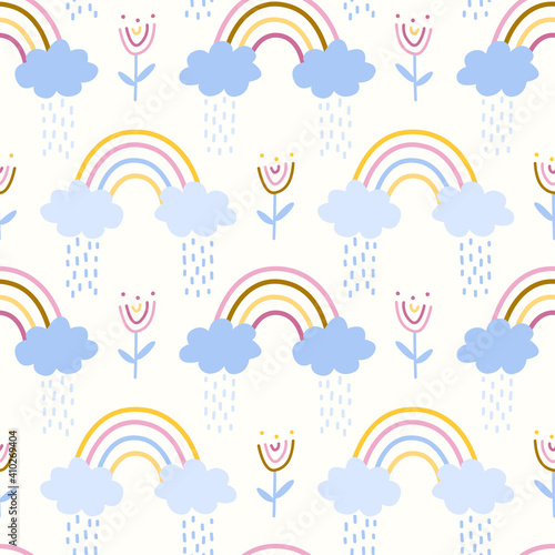 Cute baby rainbow seamless repeat pattern, clouds, rainbow, rain, flowers. Pastel shades.