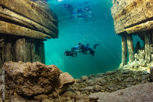 Scuba diver exploring Lake Atter with diver propulsion vehicle photo