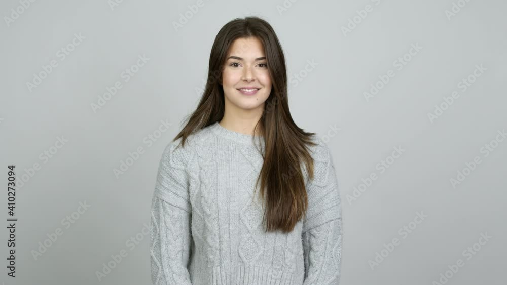 Teenager Brazilian girl with happy face over isolated background Teenager Brazilian girl with happy face over isolated background