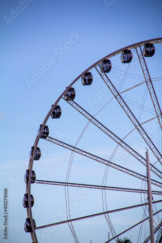 Close Side of Large Ferris Wheel in Blue Sky