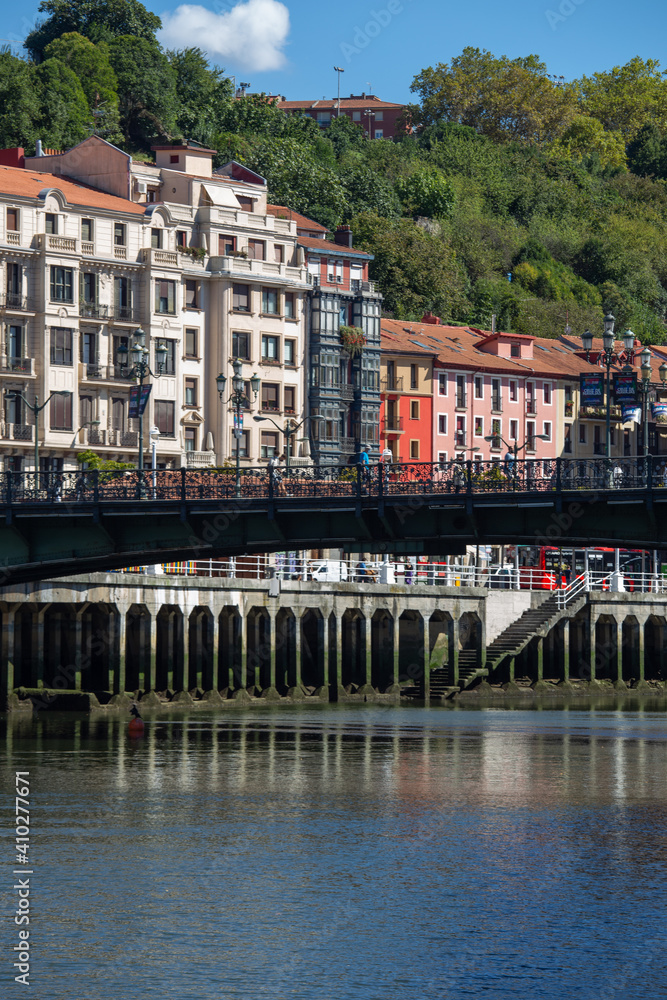 view of the old town of Bilbao from the estuary on a sunny day with blue sky, Bilbao, Bizkaia, Basque Country, Spain, Europe