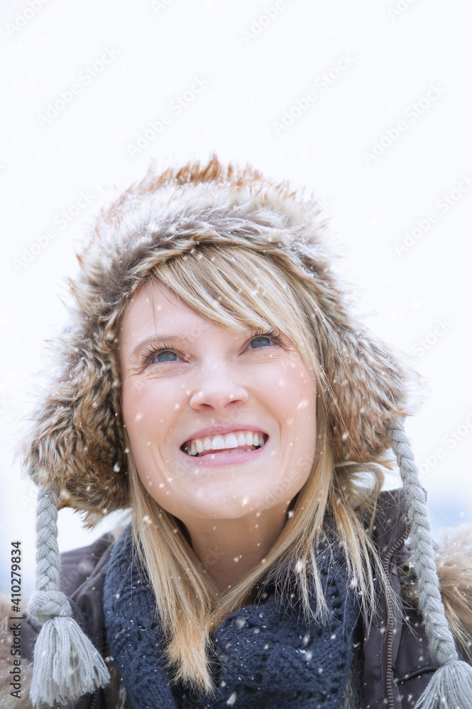 Portrait of woman wearing knit hat smiling Portrait of woman wearing knit hat smiling
