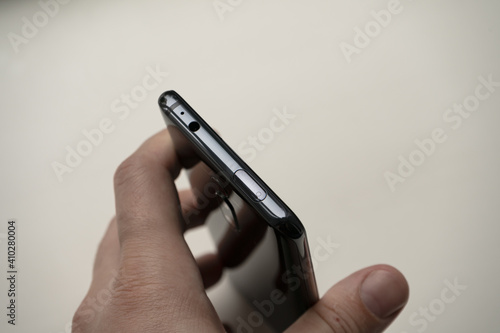 Novosibirsk, Novosibirsk region, Russian Federation, 29.06.2020. The end of the smartphone Xiaomi Mi 9T, close-up on a white background