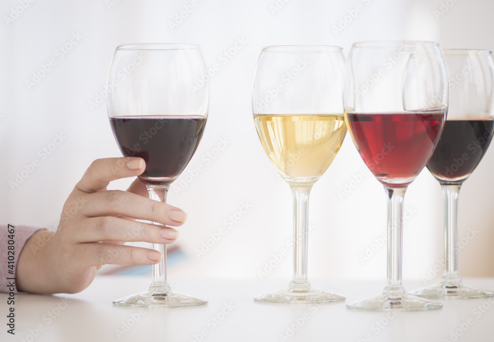 Glasses with red, rose and white wine Glasses with red, rose and white wine