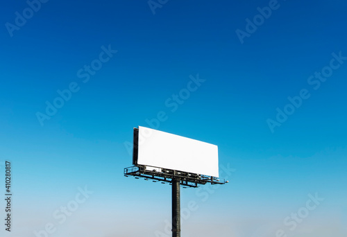 Billboard under blue sky photo