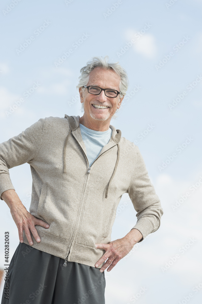 Portrait of senior man standing outdoors Portrait of senior man standing outdoors