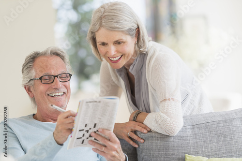 Senior couple doing crossword