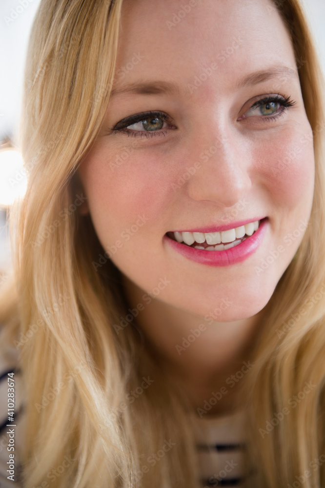 Portrait of smiling young woman Portrait of smiling young woman