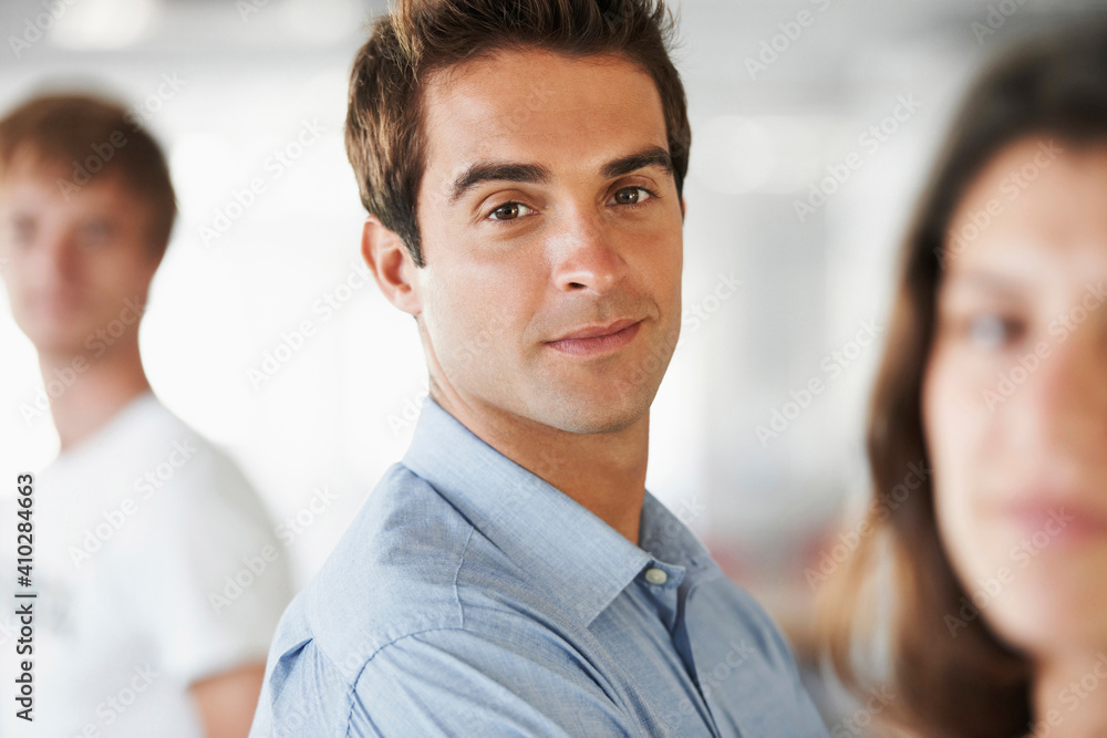 Portrait of man and two other people Portrait of man and two other people