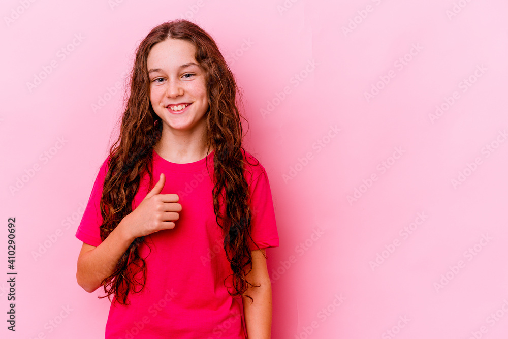 Little caucasian girl isolated on pink background smiling and raising thumb up Little caucasian girl isolated on pink background smiling and raising thumb up