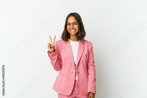 Young latin business woman isolated on white background tired of a repetitive task.