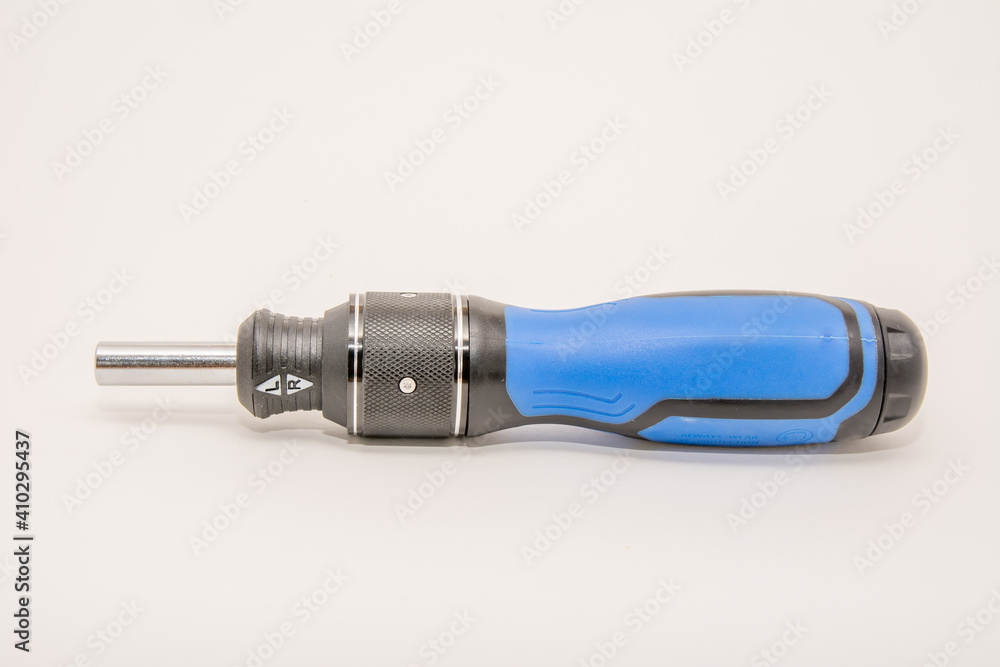 magnetic multi-bit screwdriver on white background magnetic multi-bit screwdriver on white background