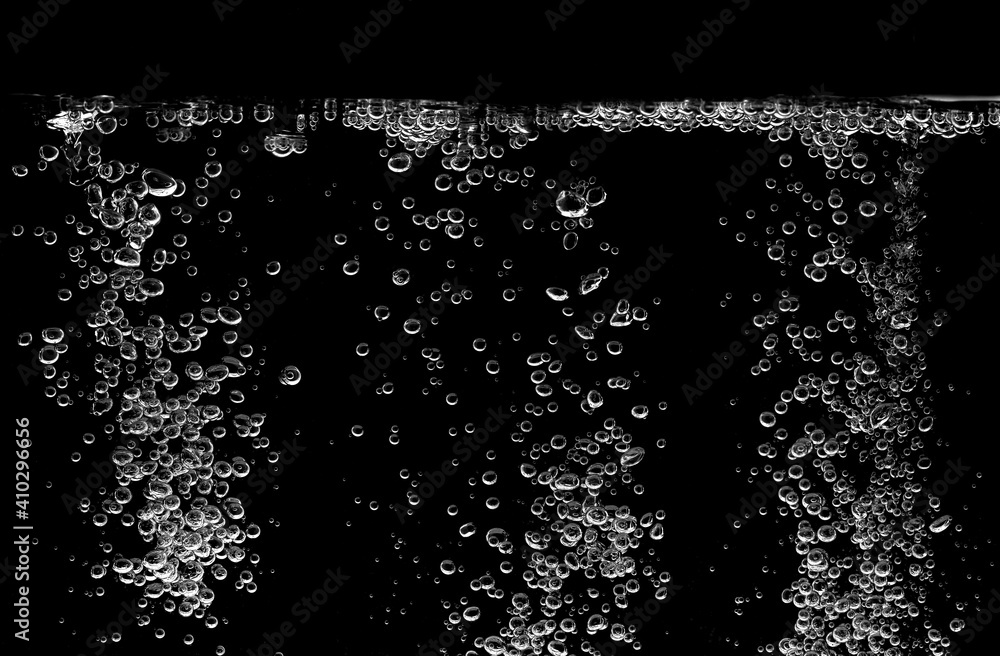 collection water bubble white oxygen air, in underwater clear liquid with bubbles flowing up on the water surface, isolated on a black background