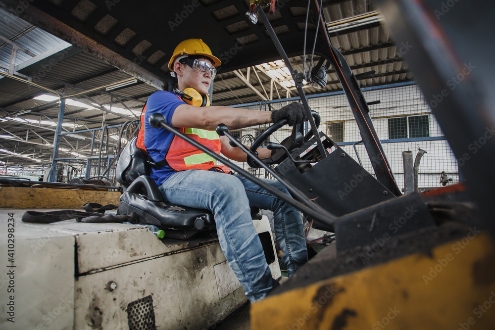 worker forklift driver working in industrial factory or warehouse. worker Asia worker forklift driver working in industrial factory or warehouse. worker Asia