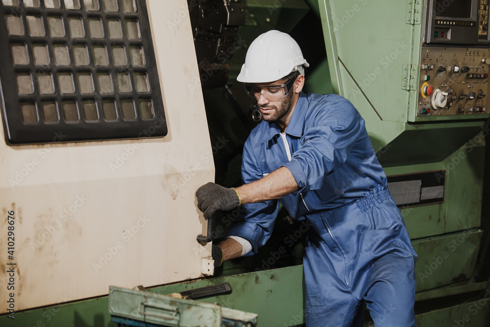 worker in factory on the machine worker in factory on the machine