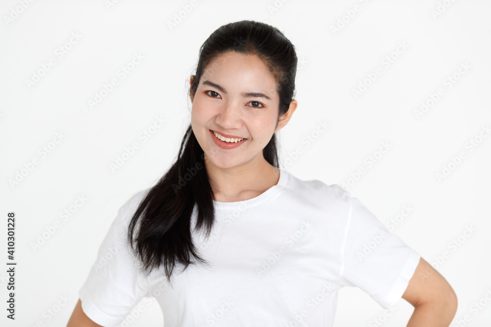 Portrait of a young teen Asian woman with a black long hair on white background Portrait of a young teen Asian woman with a black long hair on white background