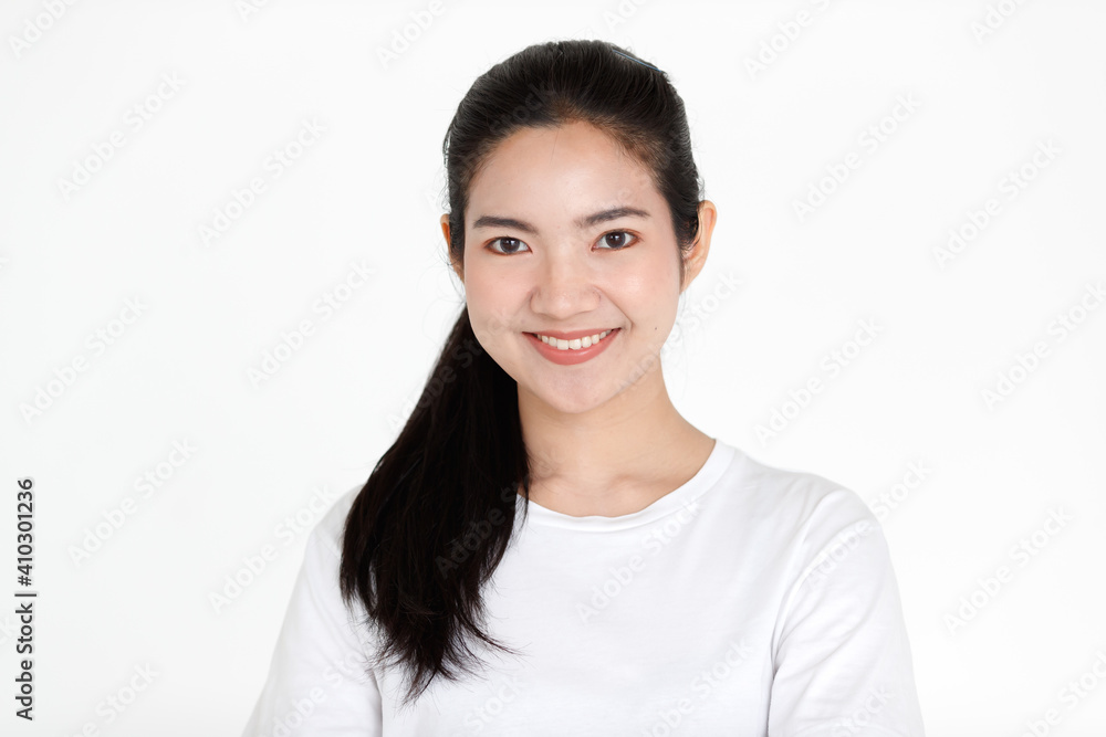 Portrait of a young teen Asian woman with black long hair on white background Portrait of a young teen Asian woman with black long hair on white background