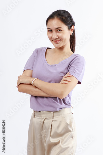 Portrait of a beauty smiling asian women, Closeup portrait of beautiful Asian woman on white background. © Bangkok Click Studio