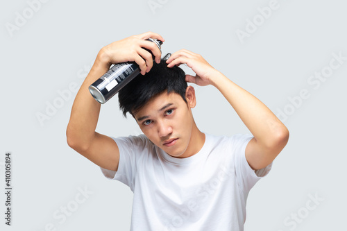Vászonkép Handsome young men styling their hair.