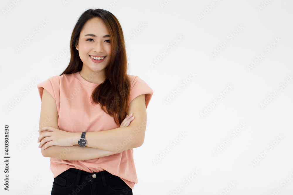 portrait of young pretty Asian woman with beautiful long hair and fair skin wearing casual dress poses and looking at a camera isolated on white background. Happy, positive person concept portrait of young pretty Asian woman with beautiful long hair and fair skin wearing casual dress poses and looking at a camera isolated on white background. Happy, positive person concept