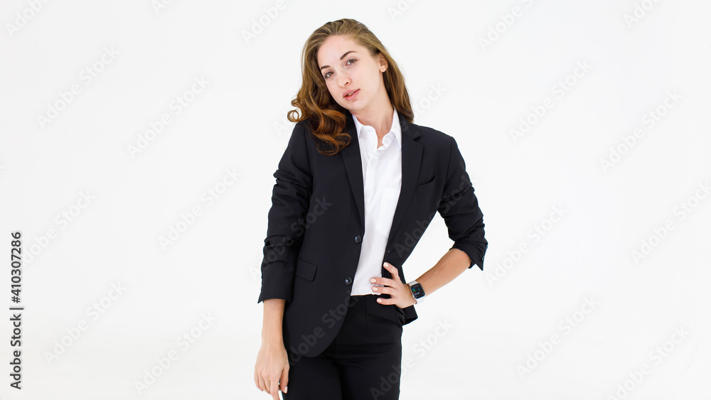The image portrait. Happy beautiful caucasian woman in a businesswoman suit. A black suit is holding a shirt In the studio with a white background. The image portrait. Happy beautiful caucasian woman in a businesswoman suit. A black suit is holding a shirt In the studio with a white background.