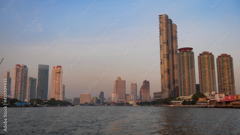 January 2 2021 - Bangkok, Thailand : Beautiful Landscape of high modern building at Chaopraya River, Bangkok, Thailand