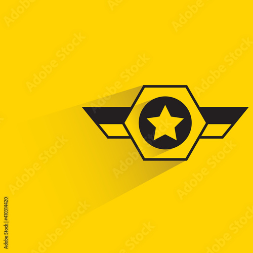 star medal of honor with shadow on yellow background