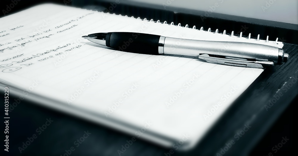 notebook with pen