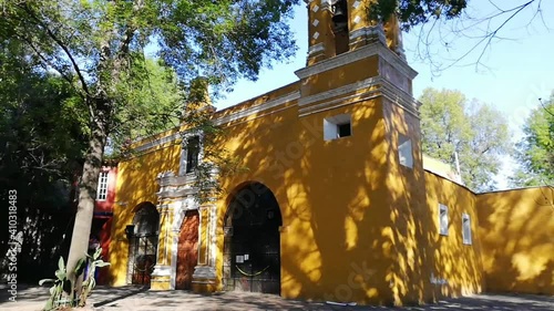 Old Mexican Church surrounded by trees in Coyoacan