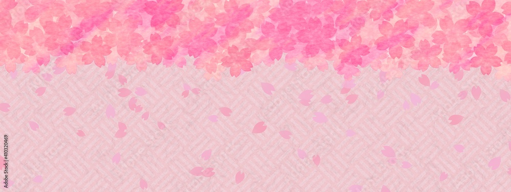 ピンクの算木崩し模様と舞う桜の背景素材