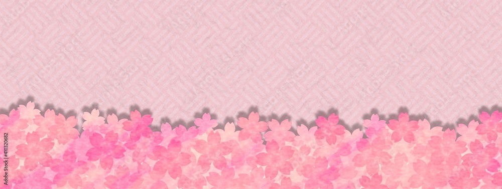 ピンク色の算木崩し模様と桜の背景素材（逆さでも使用可能）