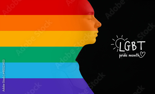 Rainbow silhouette of young...