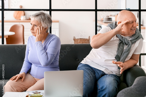 Elderly couple experiencing...
