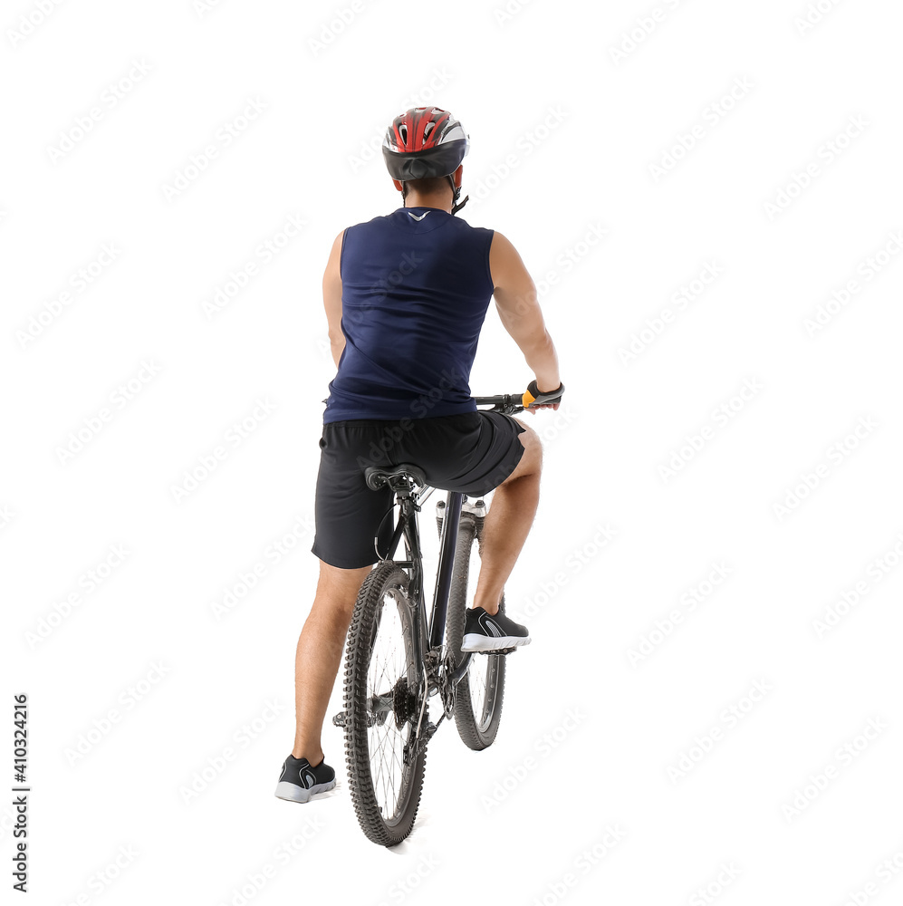 Naklejka premium Male cyclist riding bicycle on white background