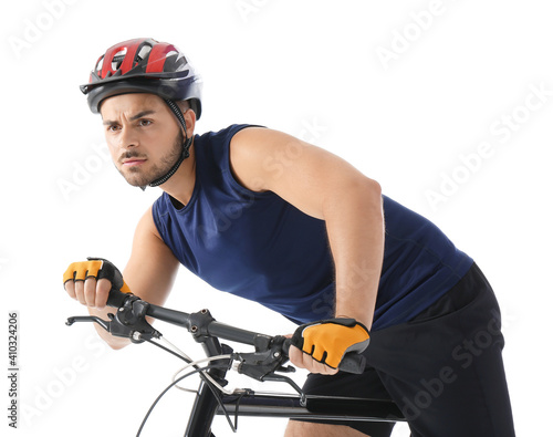Male cyclist riding bicycle...