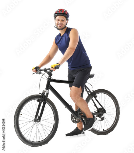 Male cyclist riding bicycle on white background © Pixel-Shot