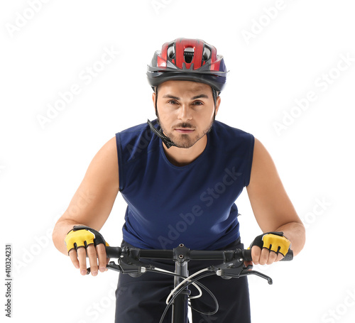 Male cyclist riding bicycle...