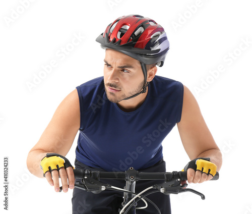 Male cyclist riding bicycle...